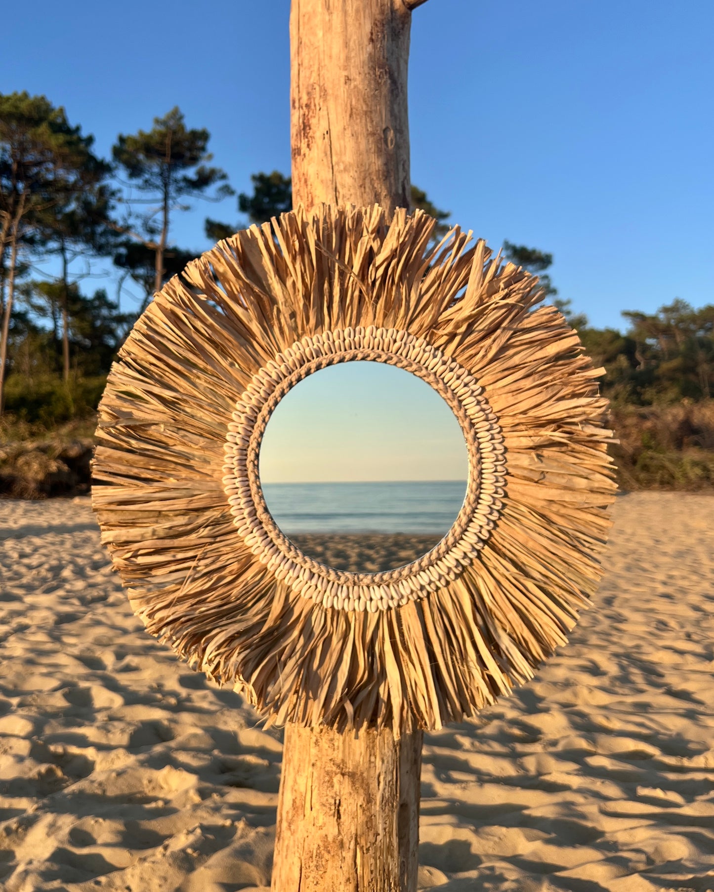 Miroir en feuilles de palmier et Cauris - Modèle Sinar