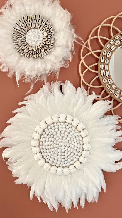 Décoration murale plume et coquillages